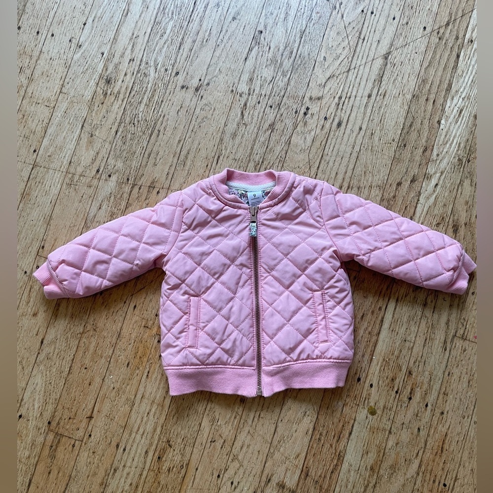 Quilted coat with floral details
